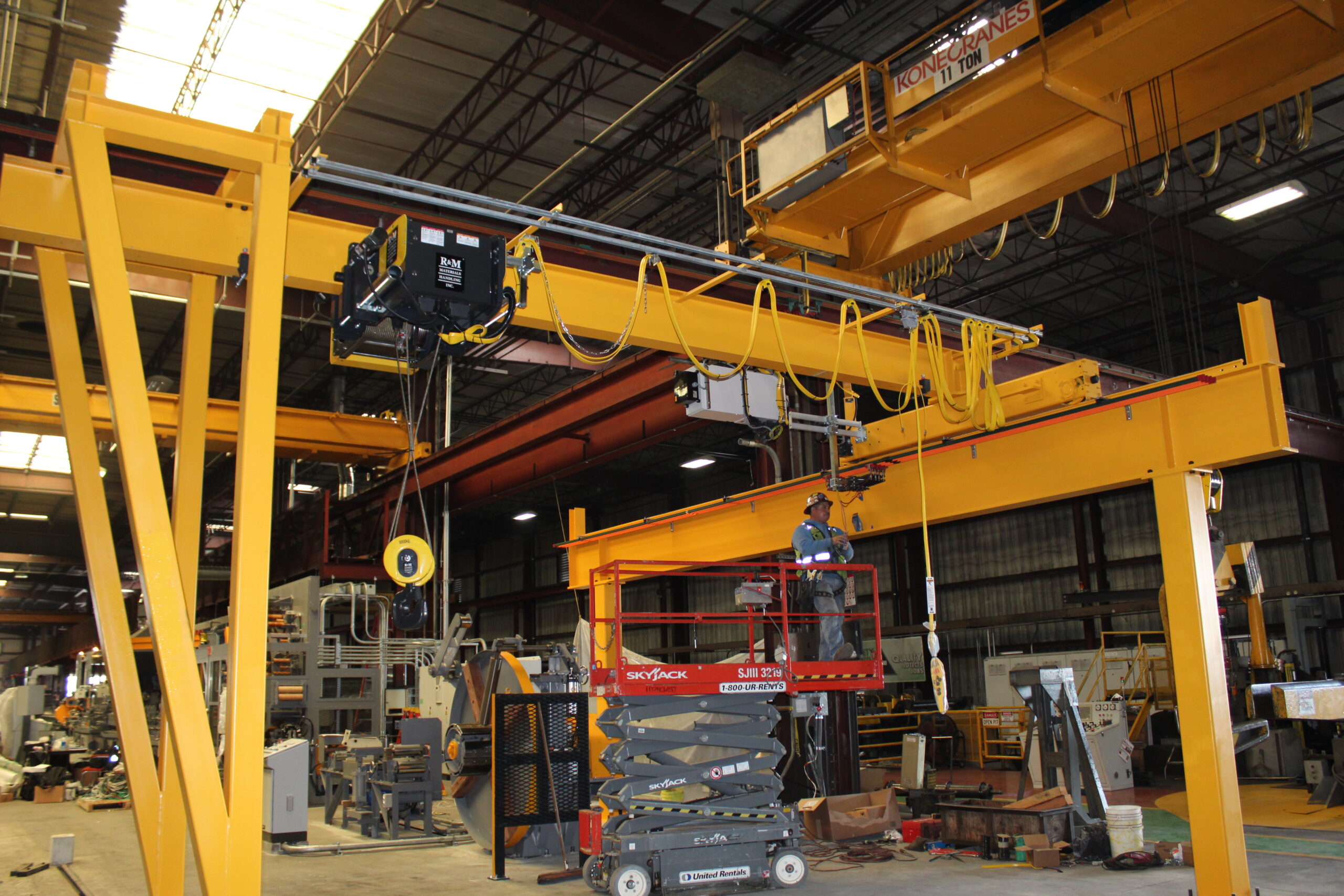 An indoor instrustrial crane being test