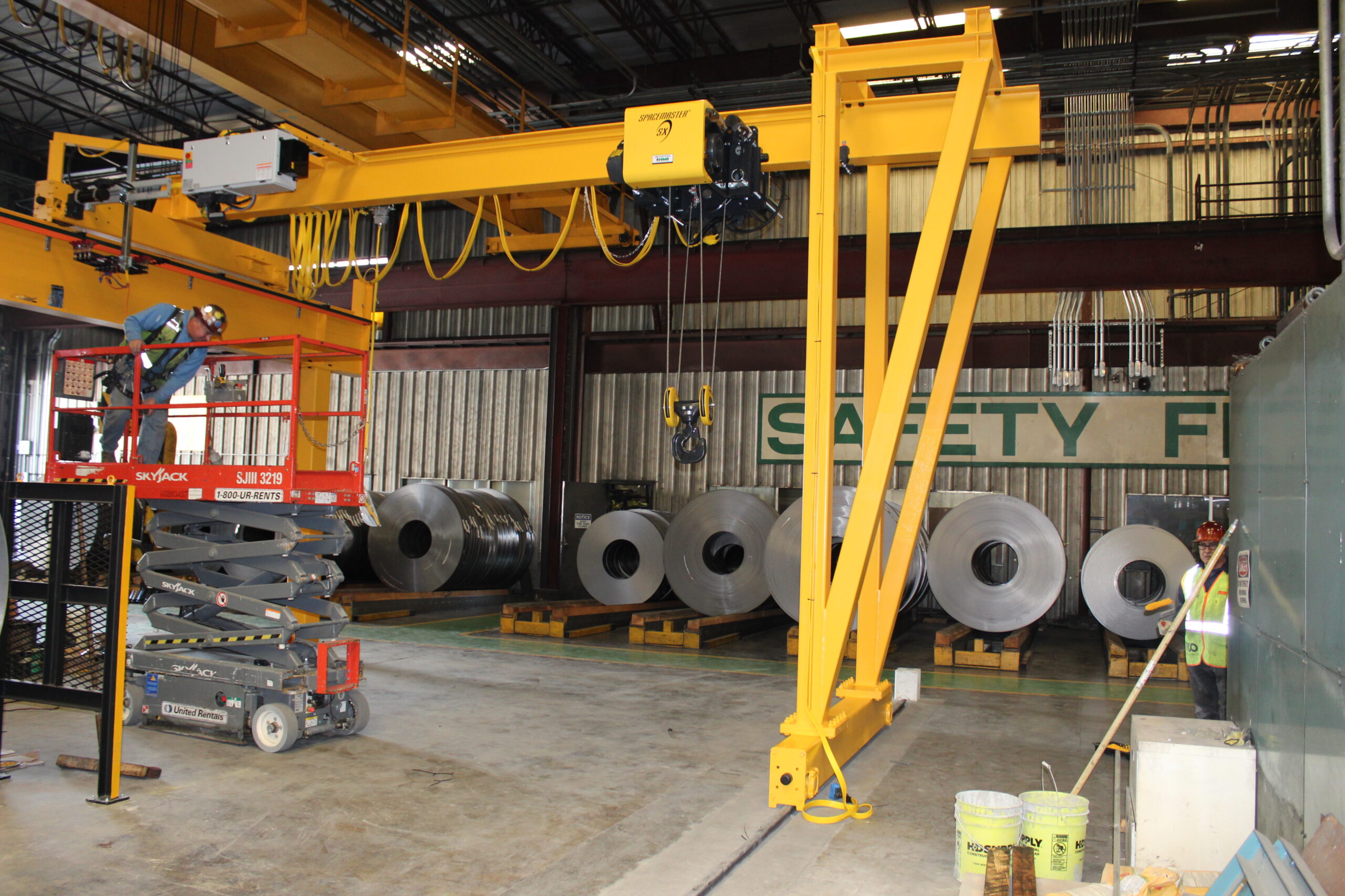 An indoor instrustrial crane being test