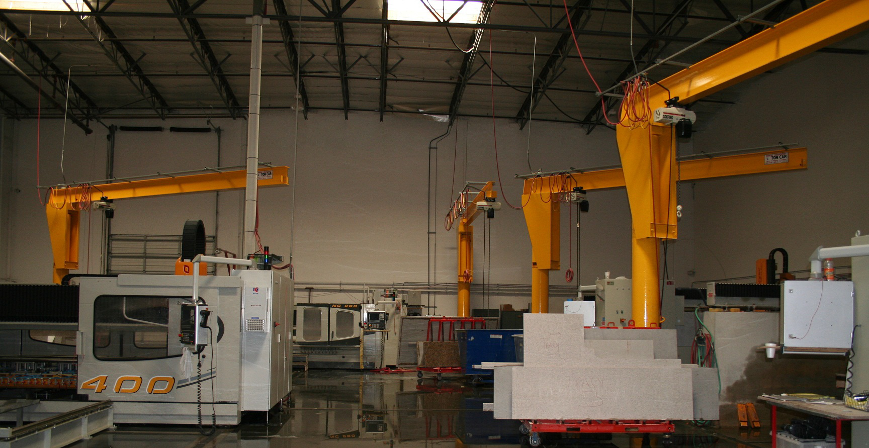 An indoor instrustrial crane being test