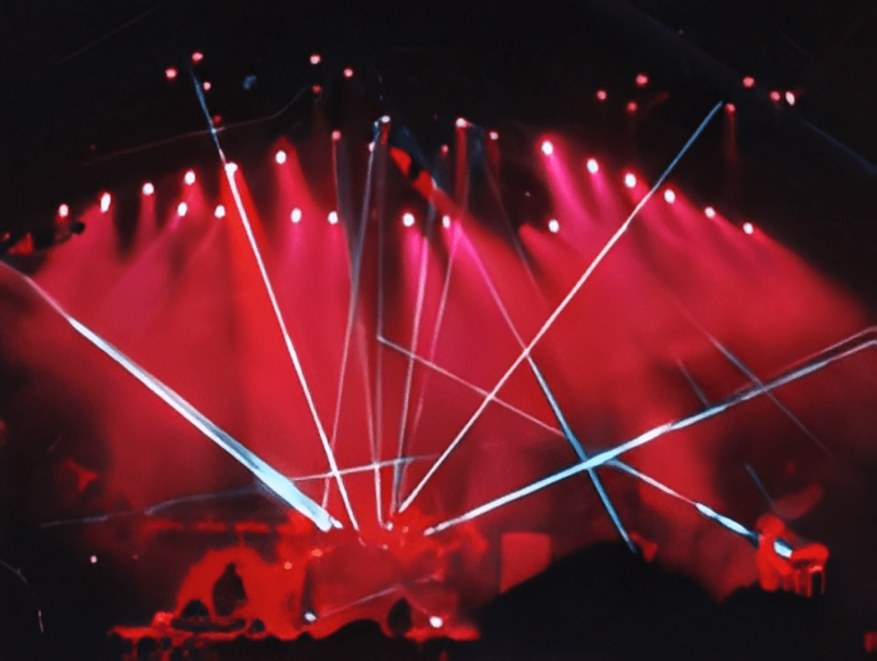 Concert stage with vibrant light beams