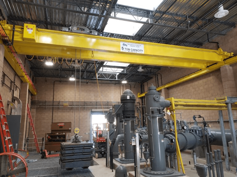 Yellow crane in industrial setting