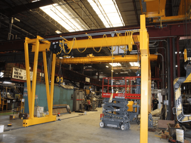 Yellow industrial crane in warehouse