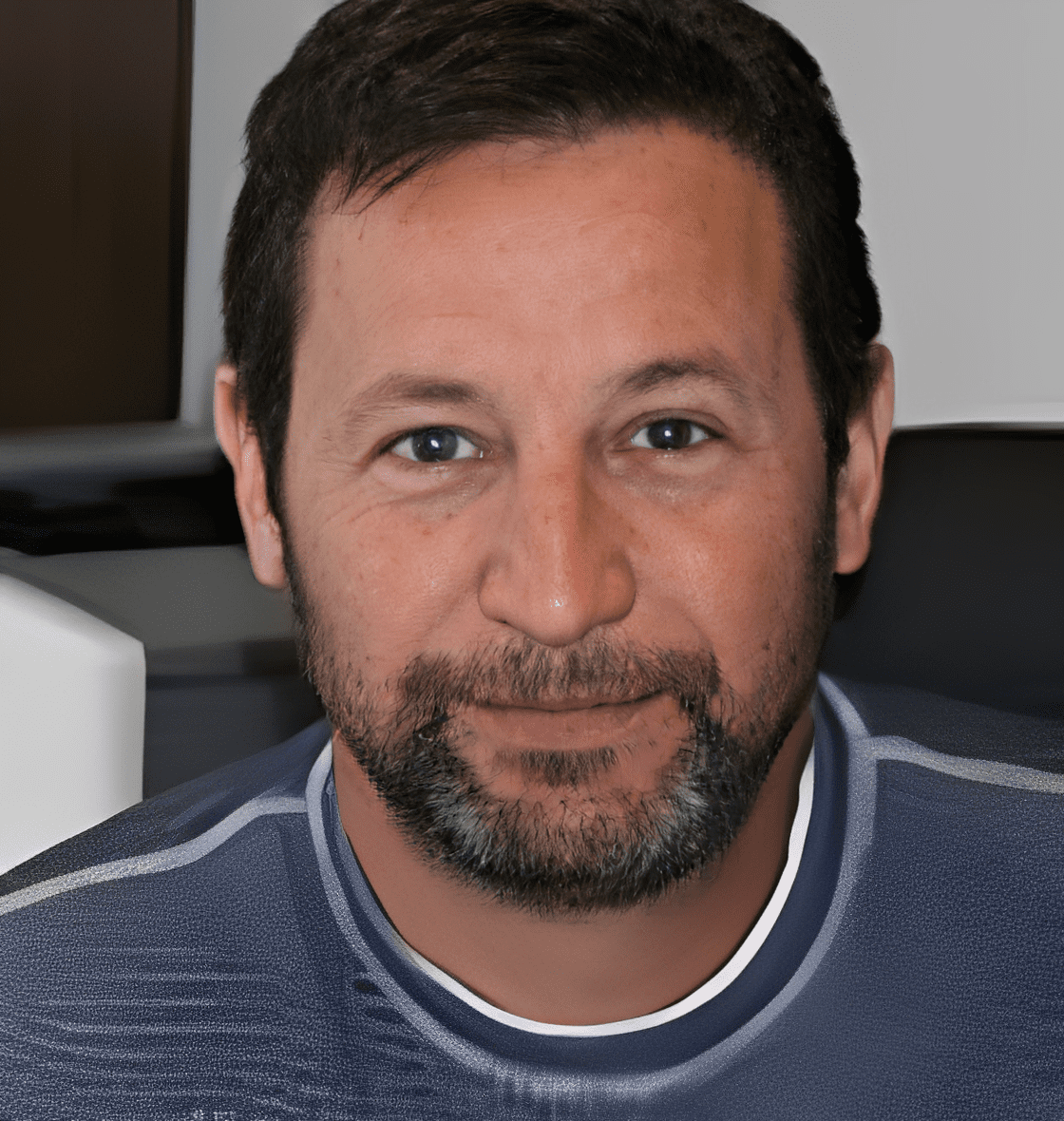 Bearded man in casual shirt