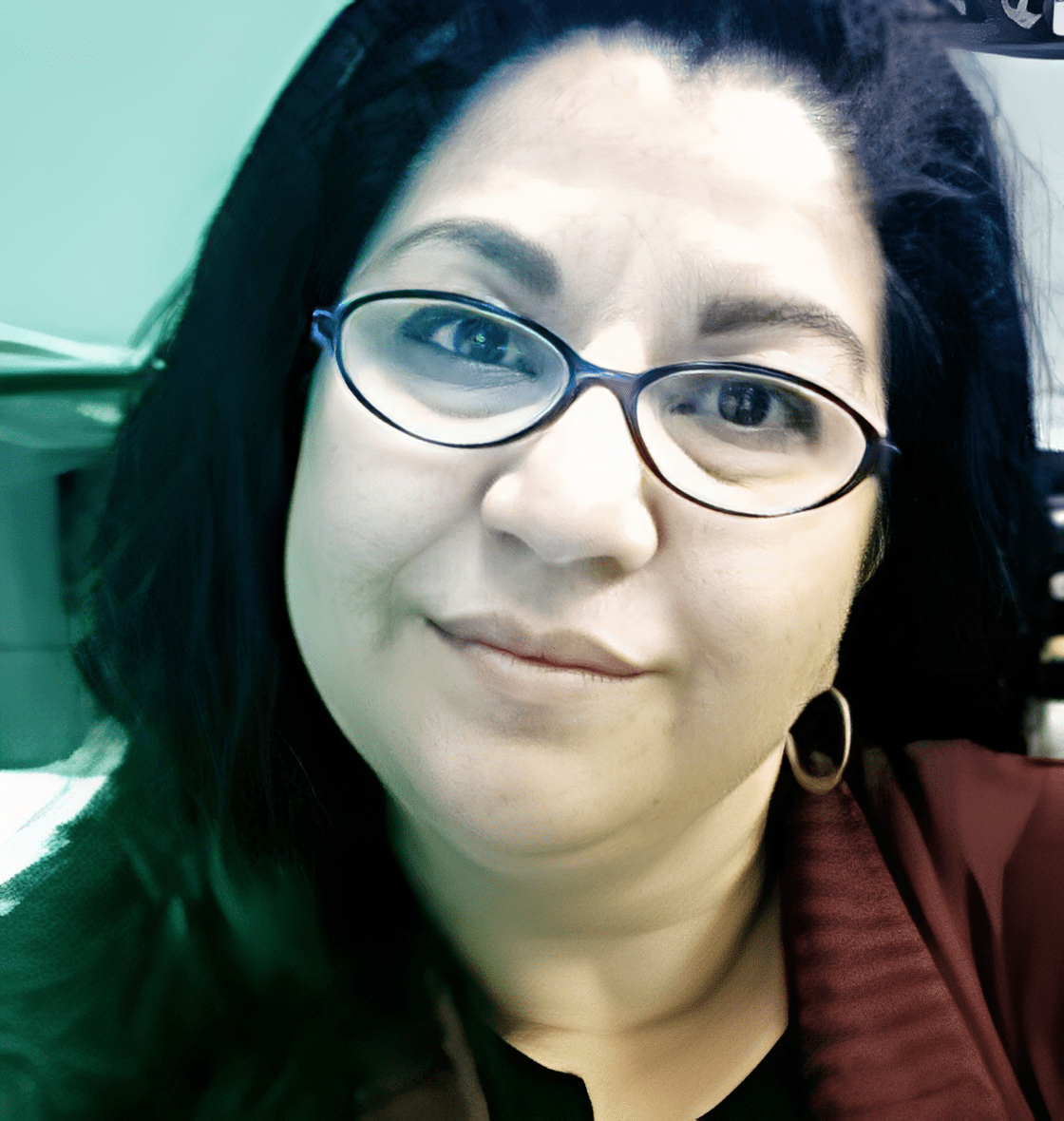 Smiling woman wearing hoop earrings