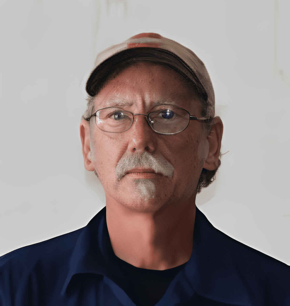 Man in blue shirt and hat