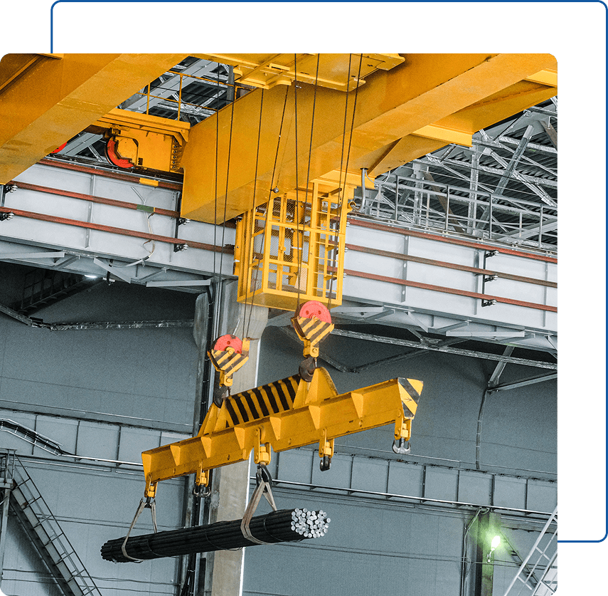 Industrial crane lifting metal rods